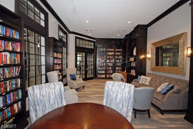 10 Cliff Rd Unit A3, Woodland Park, NJ 07424 - sitting room featuring ornamental molding, bookshelves, and recessed lighting
