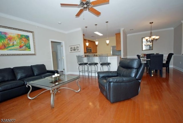 10 Cliff Rd Unit A3, Woodland Park, NJ 07424 - living room featuring wood finished floors, a chandelier, ceiling fan, and crown molding
