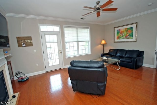 10 Cliff Rd Unit A3, Woodland Park, NJ 07424 - living room featuring ceiling fan, crown molding, wood finished floors, and a fireplace