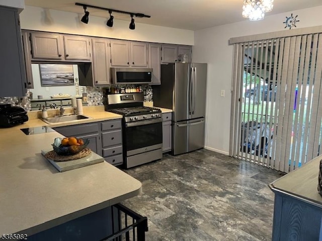 1212 Beaver Dam Rd Unit 15, Point Pleasant Boro, NJ 08742 - kitchen with appliances with stainless steel finishes, gray cabinets, light countertops, and rail lighting