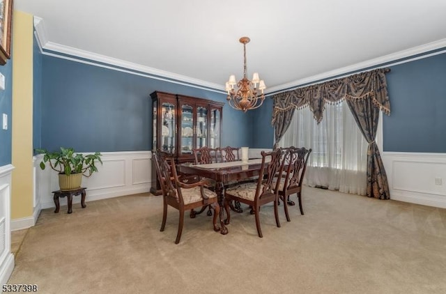 36 Crestview Dr, Clinton Twp, NJ 08809 - dining area featuring a chandelier, carpet, ornamental molding, a decorative wall, and wainscoting