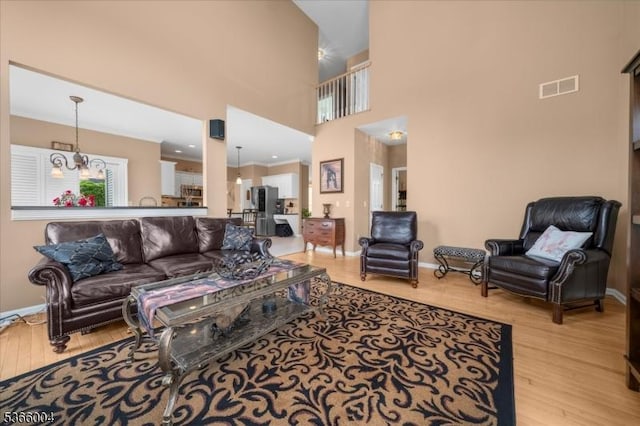 18 Running Brook Cir, Raritan Twp, NJ 08822 - living area with wood finished floors and a towering ceiling