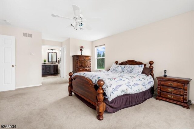 18 Running Brook Cir, Raritan Twp, NJ 08822 - carpeted bedroom featuring ensuite bath and ceiling fan