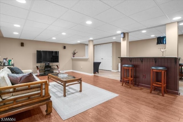 18 Running Brook Cir, Raritan Twp, NJ 08822 - living room featuring bar area and light wood-style floors