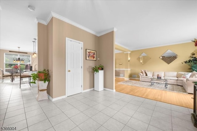 18 Running Brook Cir, Raritan Twp, NJ 08822 - living room with crown molding, light tile patterned flooring, and a chandelier