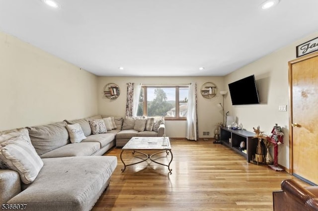 132 N 17th St, Prospect Park Boro, NJ 07508 - living area with light wood-type flooring and recessed lighting