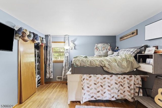 132 N 17th St, Prospect Park Boro, NJ 07508 - bedroom featuring light wood-style flooring