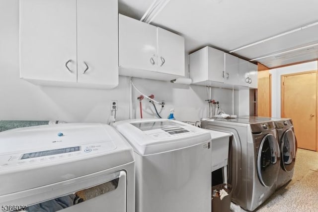 132 N 17th St, Prospect Park Boro, NJ 07508 - laundry area featuring cabinet space and washer and dryer