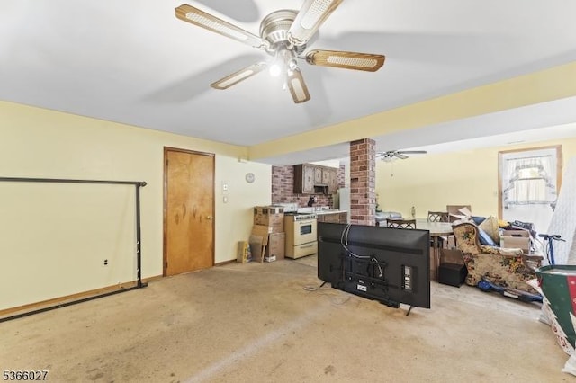 132 N 17th St, Prospect Park Boro, NJ 07508 - living area with ceiling fan, decorative columns, and carpet floors