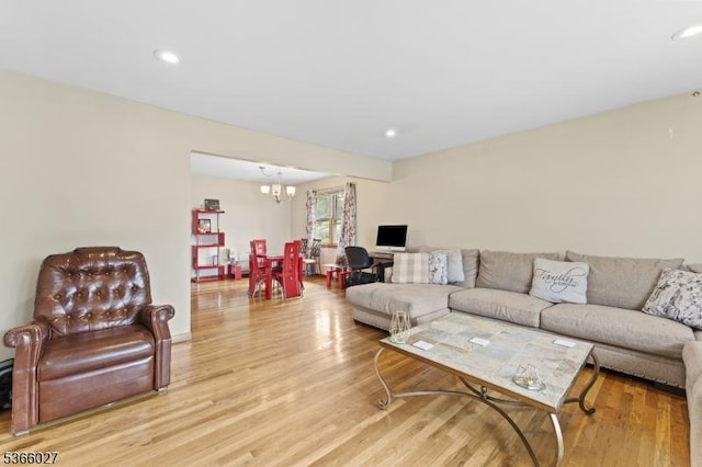 132 N 17th St, Prospect Park Boro, NJ 07508 - living area featuring light wood-type flooring, a chandelier, and recessed lighting