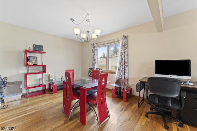 132 N 17th St, Prospect Park Boro, NJ 07508 - dining room featuring a chandelier and hardwood / wood-style floors
