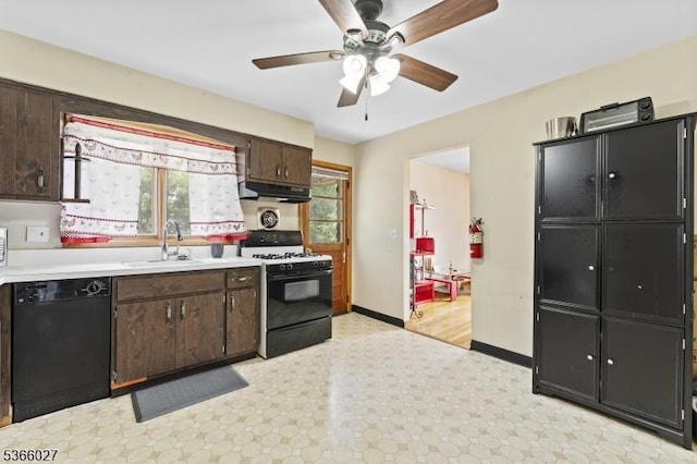 132 N 17th St, Prospect Park Boro, NJ 07508 - kitchen featuring dishwasher, range with gas cooktop, light flooring, light countertops, and under cabinet range hood