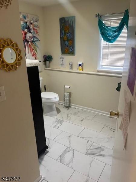800 Raritan Rd, Clark Twp, NJ 07066 - bathroom with marble finish floors and vanity