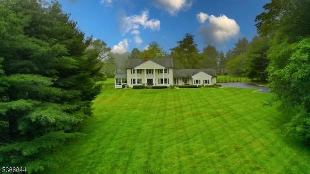 202 N Rd, Chester Twp, NJ 07930 - back of property featuring a lawn and asphalt driveway