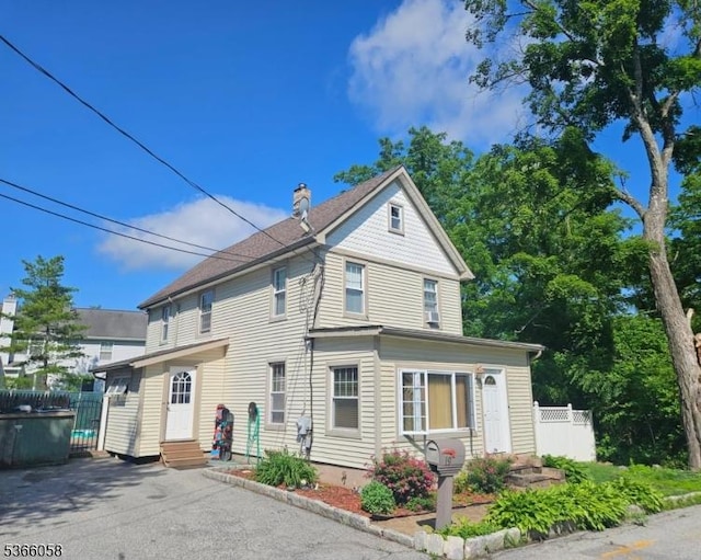 19 Card St, Hamburg Boro, NJ 07419 - view of front of house featuring entry steps and a chimney