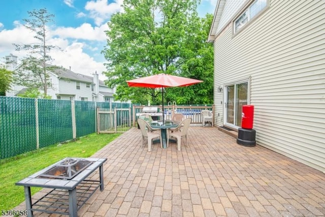 19 Card St, Hamburg Boro, NJ 07419 - fenced backyard featuring an outdoor fire pit, outdoor dining space, and a patio area
