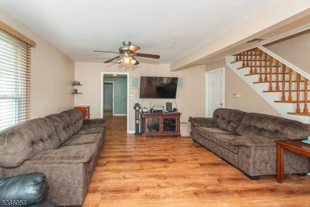 19 Card St, Hamburg Boro, NJ 07419 - living area featuring a ceiling fan, light wood-style floors, stairs, and plenty of natural light