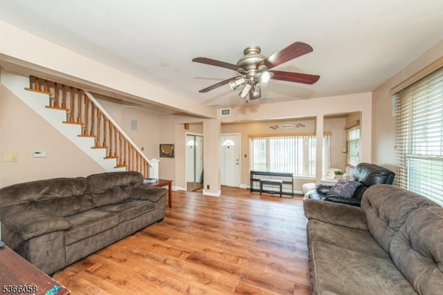 19 Card St, Hamburg Boro, NJ 07419 - living room with stairway, light wood-style flooring, plenty of natural light, and a ceiling fan