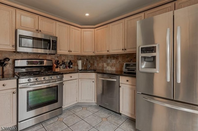 9 Cottage Ct, Berkeley Heights Twp, NJ 07922 - kitchen featuring stainless steel appliances, dark countertops, light tile patterned floors, decorative backsplash, and recessed lighting