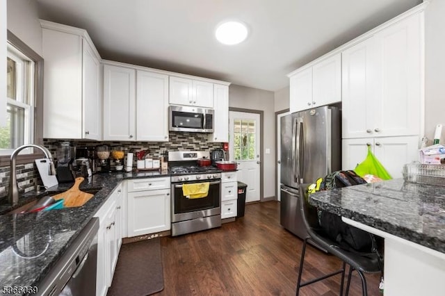 9 Beavers St, High Bridge Boro, NJ 08829 - kitchen with stainless steel appliances, backsplash, white cabinets, and dark wood-style flooring