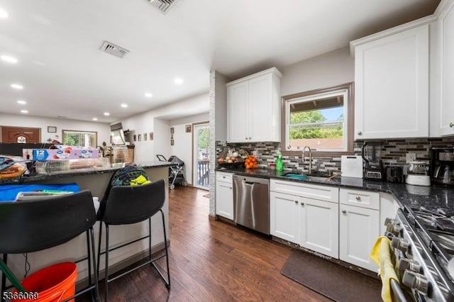 9 Beavers St, High Bridge Boro, NJ 08829 - kitchen featuring stainless steel appliances, recessed lighting, decorative backsplash, white cabinets, and dark wood finished floors