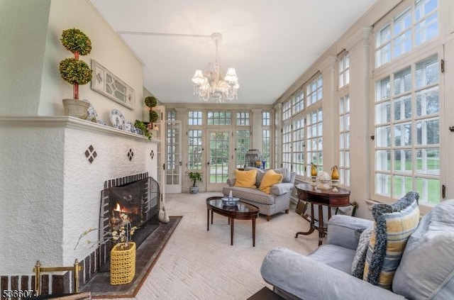701 Hillcrest Blvd, Phillipsburg Town, NJ 08865 - living room with plenty of natural light, a tiled fireplace, a chandelier, and carpet floors