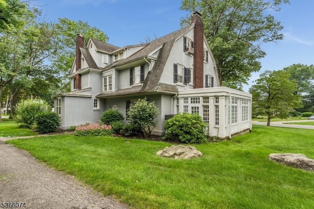 701 Hillcrest Blvd, Phillipsburg Town, NJ 08865 - view of side of property featuring a chimney, stucco siding, a lawn, and roof with shingles