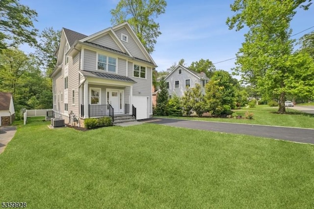 151 Center Ave, Chatham Boro, NJ 07928 - view of front of house with an attached garage, driveway, and a front yard