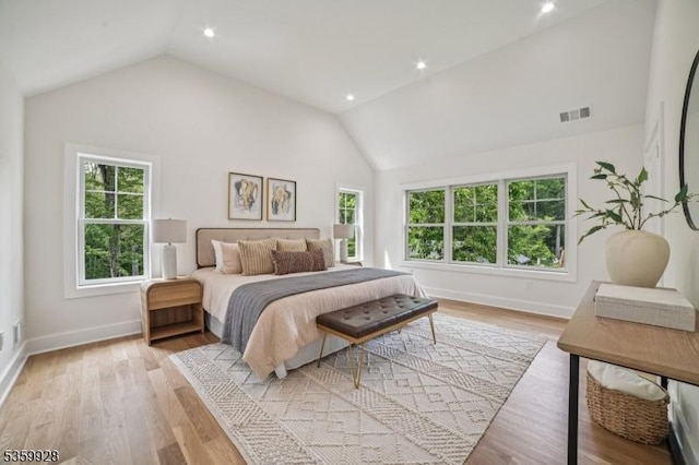 151 Center Ave, Chatham Boro, NJ 07928 - bedroom with lofted ceiling, multiple windows, wood finished floors, and recessed lighting