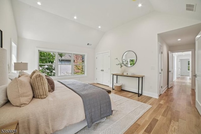 151 Center Ave, Chatham Boro, NJ 07928 - bedroom with light wood-type flooring, a closet, recessed lighting, and high vaulted ceiling