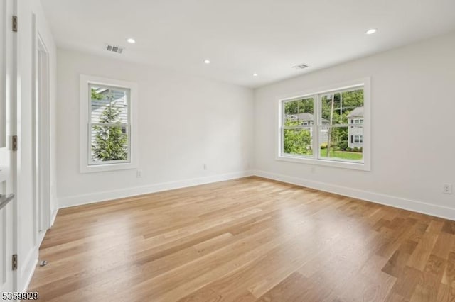 151 Center Ave, Chatham Boro, NJ 07928 - empty room with light wood finished floors and recessed lighting