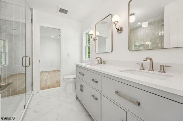 151 Center Ave, Chatham Boro, NJ 07928 - bathroom featuring marble look tile flooring, double vanity, and a shower stall