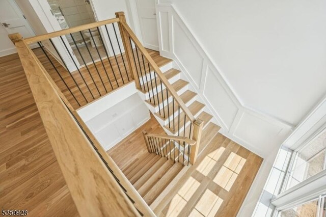 151 Center Ave, Chatham Boro, NJ 07928 - stairway featuring wood finished floors