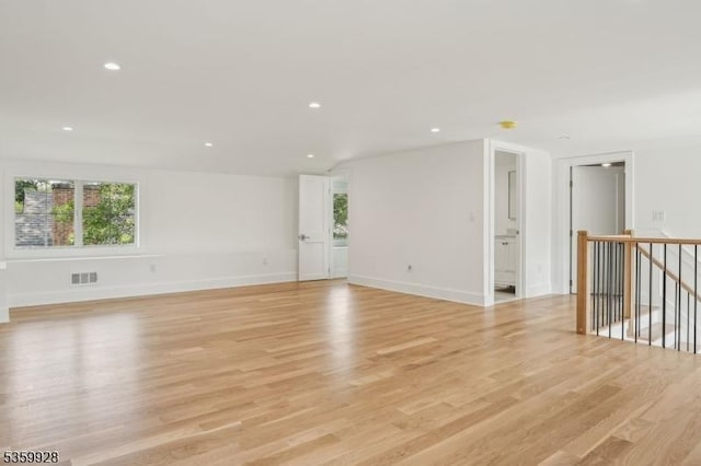 151 Center Ave, Chatham Boro, NJ 07928 - empty room featuring healthy amount of natural light, light wood finished floors, and recessed lighting