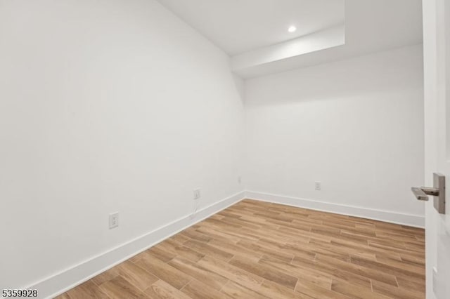 151 Center Ave, Chatham Boro, NJ 07928 - empty room with light wood-style flooring and recessed lighting