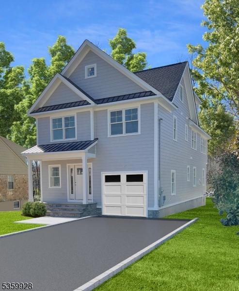 151 Center Ave, Chatham Boro, NJ 07928 - view of front of house with a standing seam roof, an attached garage, and a metal roof