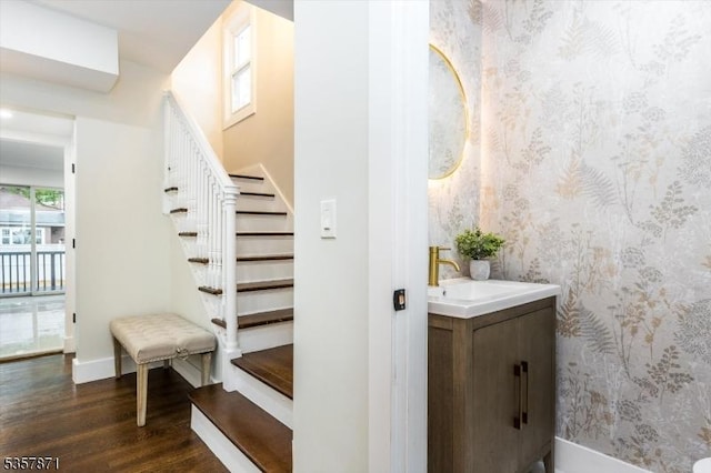 121 S Kingman Rd, South Orange Village Twp, NJ 07079 - staircase featuring wood finished floors and wallpapered walls