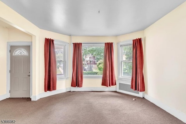 1432 Munn Ave, Hillside Twp, NJ 07205 - carpeted empty room featuring baseboards and radiator