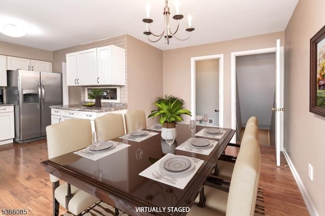 167 Riva Dr, Mansfield Twp, NJ 07840 - dining space featuring a chandelier and wood finished floors