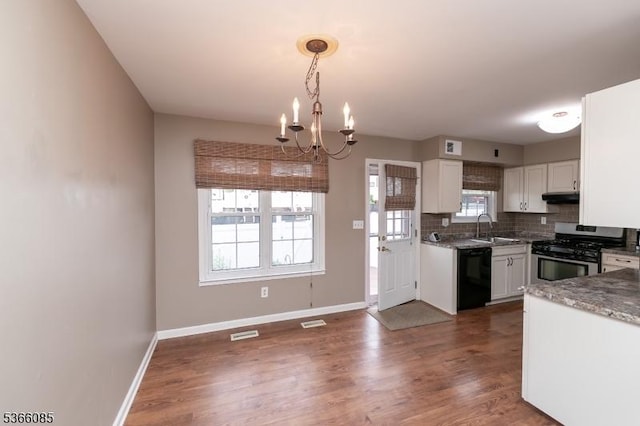 167 Riva Dr, Mansfield Twp, NJ 07840 - kitchen with stainless steel gas range, dishwasher, under cabinet range hood, white cabinets, and tasteful backsplash