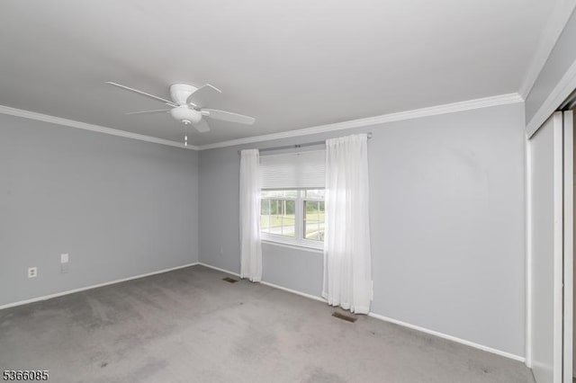 167 Riva Dr, Mansfield Twp, NJ 07840 - empty room with a ceiling fan, crown molding, and carpet floors