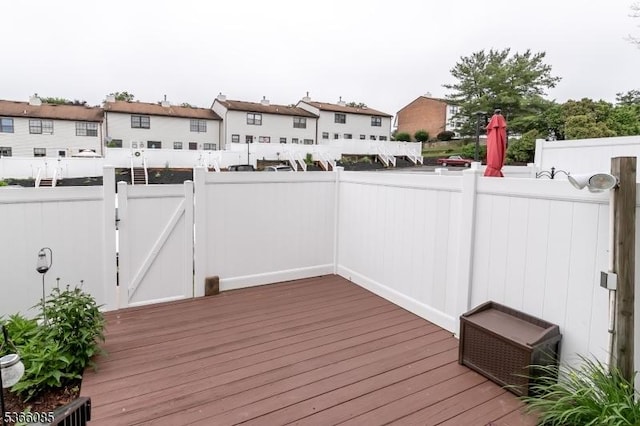 167 Riva Dr, Mansfield Twp, NJ 07840 - wooden terrace featuring a gate and a residential view