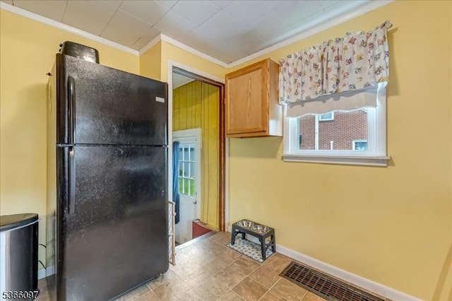 159 Aurora St, Lopatcong Twp, NJ 08865 - kitchen featuring freestanding refrigerator, ornamental molding, and light tile patterned floors