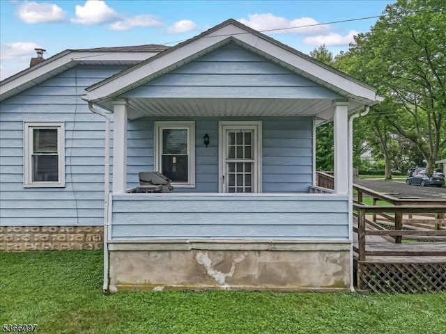 159 Aurora St, Lopatcong Twp, NJ 08865 - view of side of home with covered porch and a lawn