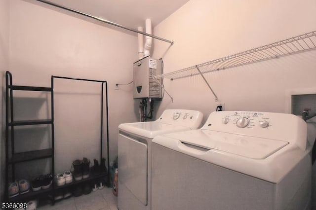 28 Elston Ct Unit 28, Wanaque Boro, NJ 07420 - laundry area featuring separate washer and dryer and light tile patterned flooring