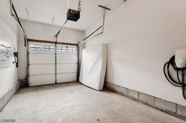 28 Elston Ct Unit 28, Wanaque Boro, NJ 07420 - garage featuring a garage door opener