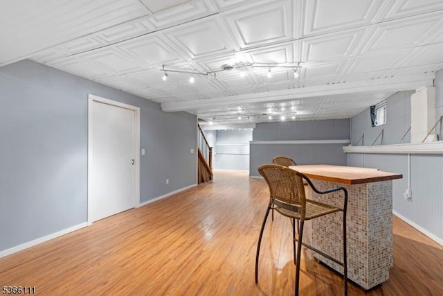 1 Lee Hill Rd, Byram Twp, NJ 07821 - bar area with stairway, wood finished floors, an ornate ceiling, and track lighting