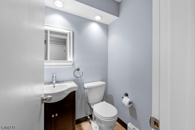 1 Lee Hill Rd, Byram Twp, NJ 07821 - bathroom featuring vanity, baseboard heating, and tile patterned flooring