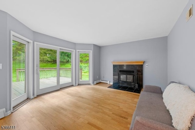 1 Lee Hill Rd, Byram Twp, NJ 07821 - living area featuring wood finished floors and baseboard heating