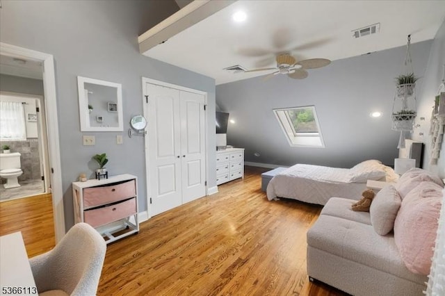19 Elm St, Wanaque Boro, NJ 07420 - bedroom with a skylight, light wood-style flooring, a closet, a ceiling fan, and ensuite bath